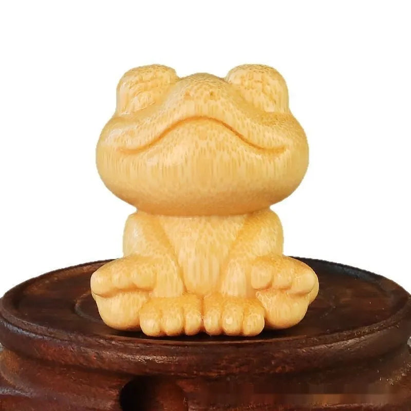 Solid bamboo smiling frog carving ornament with cartoon design, 5cm height