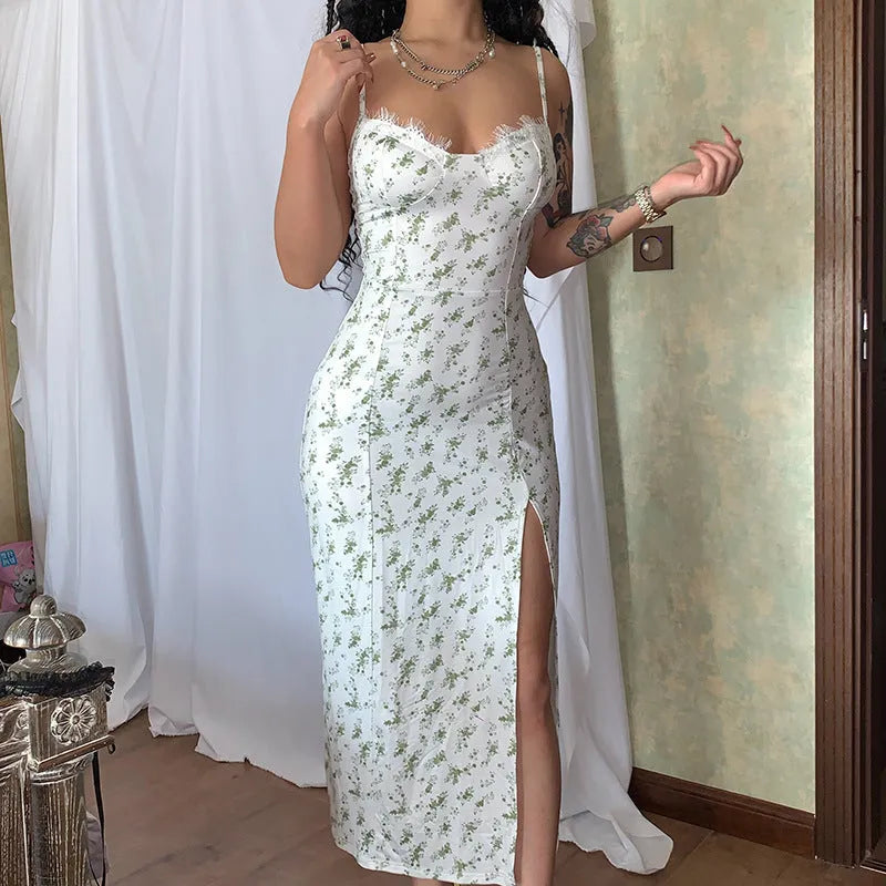 Blue lace flowers print long dress with side slit and suspender straps on a model
