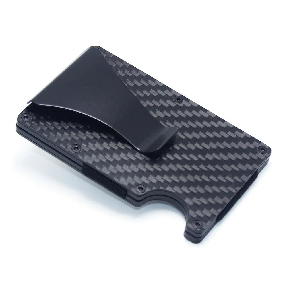 Geometric carbon fibre and aluminium slim card holder wallet in multiple colour options on a table.