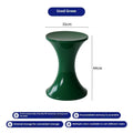Green hourglass-shaped plastic stool for changing shoes, suitable for children and adults.