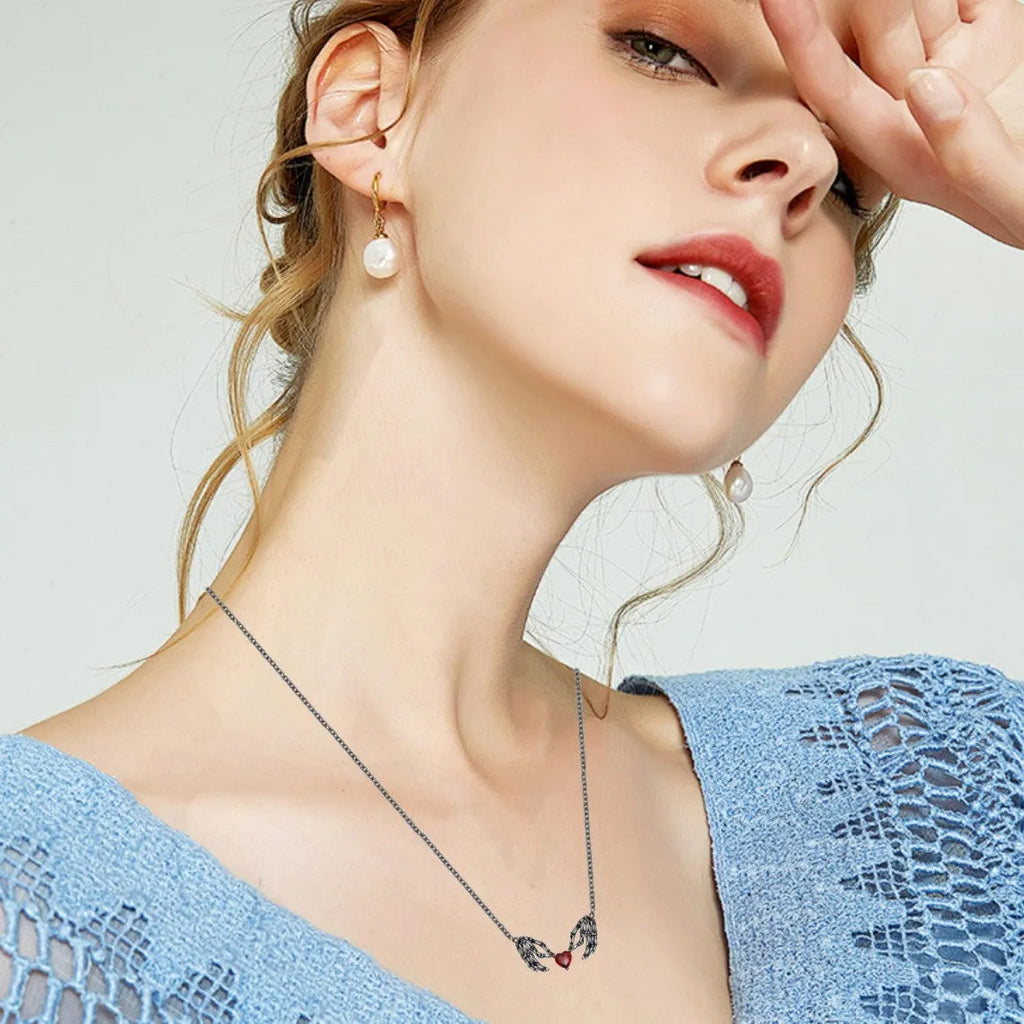 Dark red love ghost claw pendant necklace with copper heart shape on O-ring chain, adjustable perimeter 41-50cm