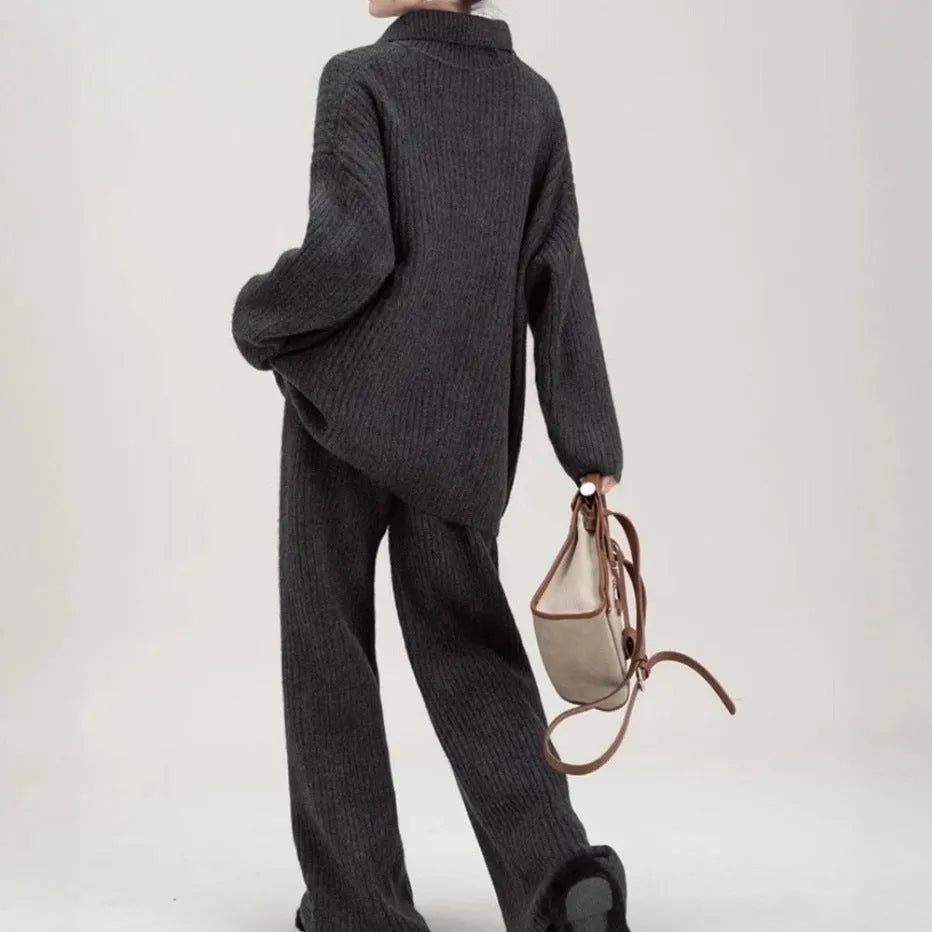 Ladies elegant knit sweater suit two-piece set in imitation cashmere, showing top and trousers in beige.