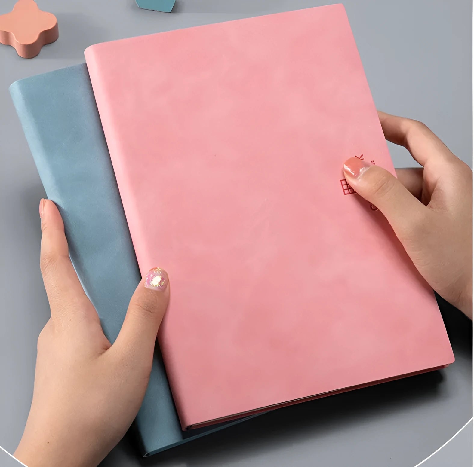 Grid book with hand-painted square grid, PU cover in lake blue, locking plastic binding, A5 size