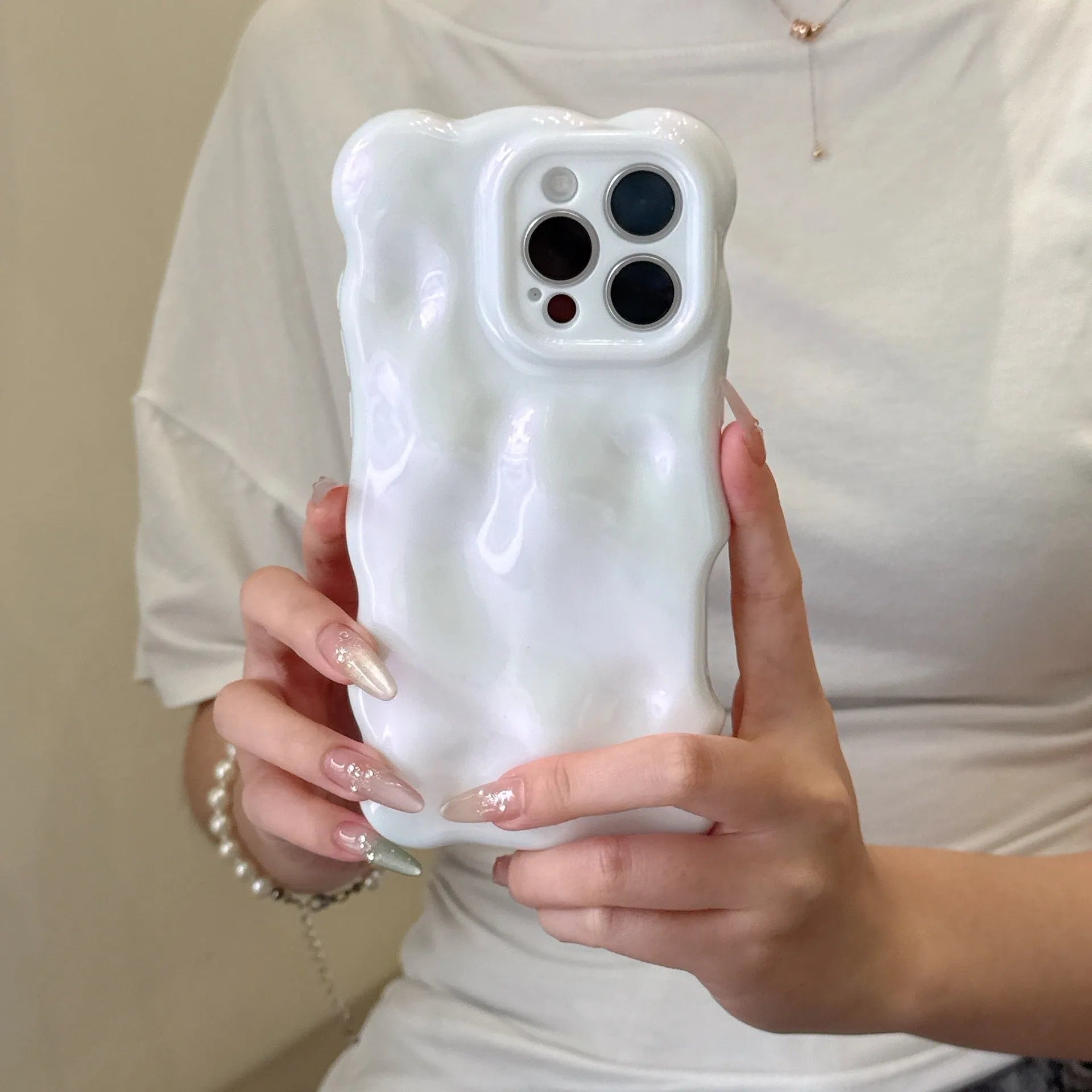 Solid colour wave shell TPU phone case in cream yellow for iPhone 14 Pro