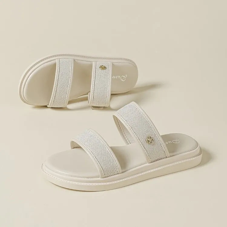 Brown women's vintage style flip-flop slippers with a soft bottom and artificial PU upper.