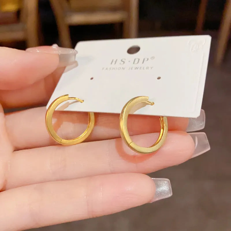 Geometric round gold plated ear clip on copper base with clip fastening