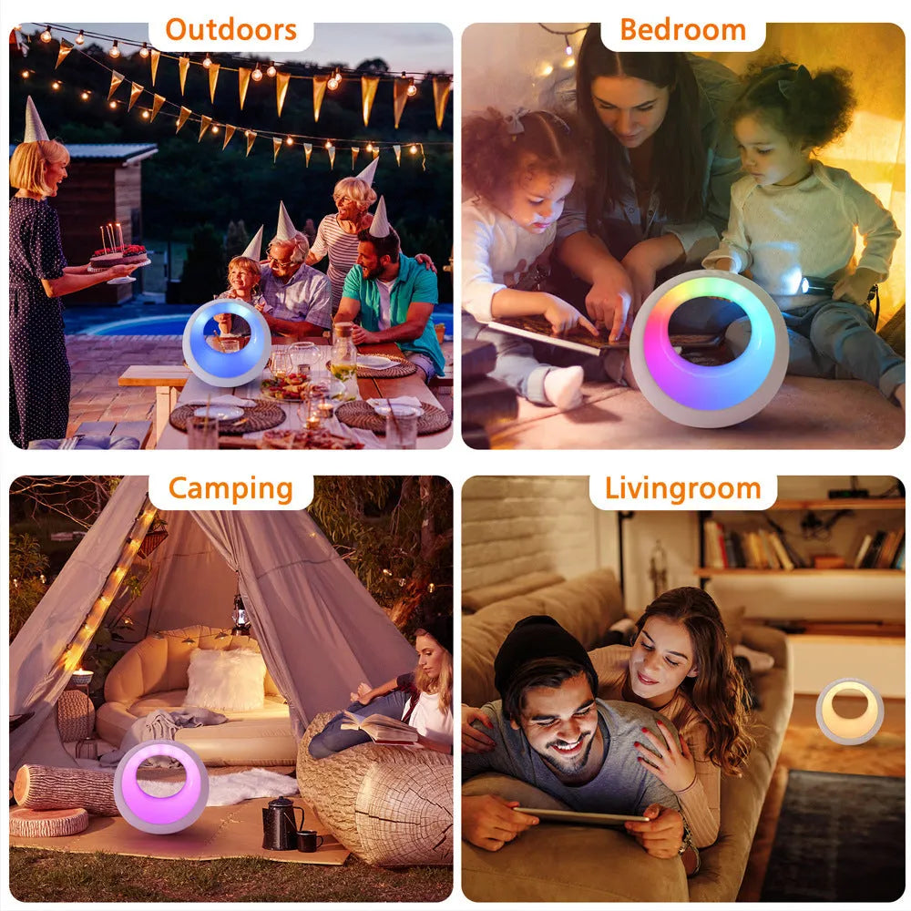 Small white RGB colour changing night lamp with remote control on wooden desk
