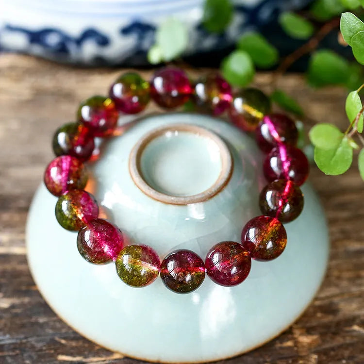 Women's watermelon crystal bracelet in pastel colours showing four size options from 6mm to 12mm diameter
