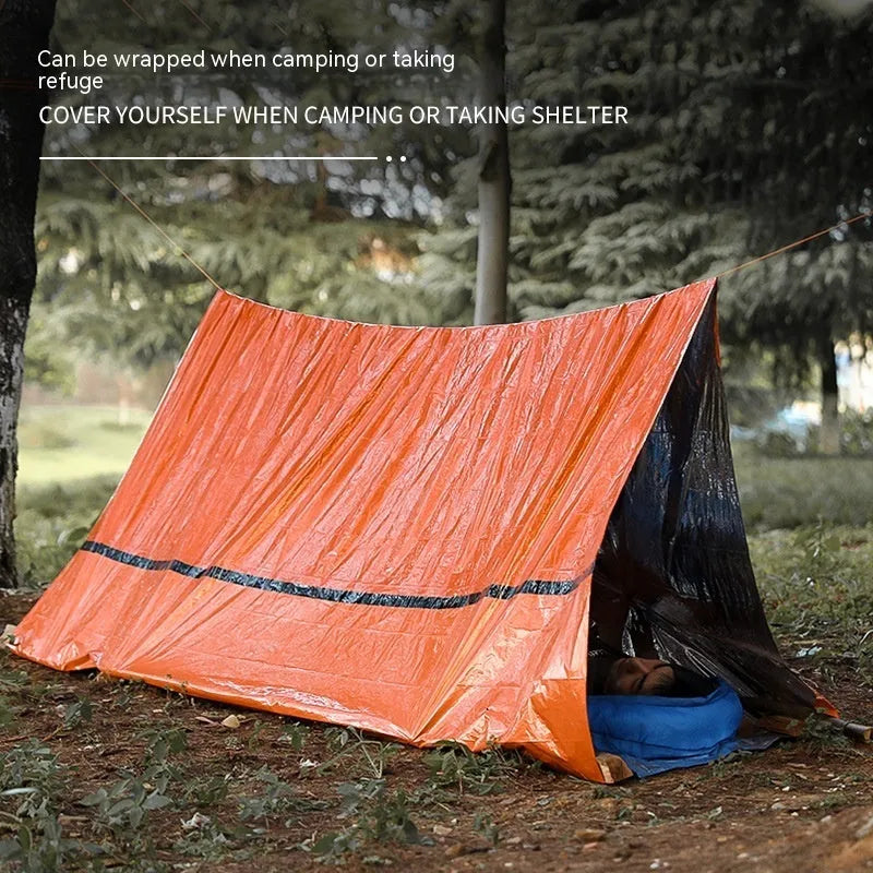 Orange emergency tent kit with sleeping bag, raincoat and whistle for disaster relief