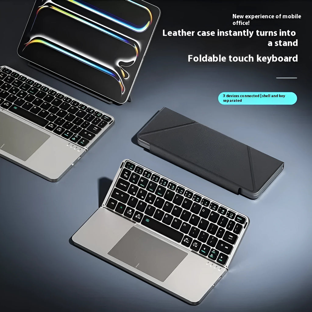 Grey wireless Bluetooth folding keyboard for mobile phones and tablets showing compact folded design