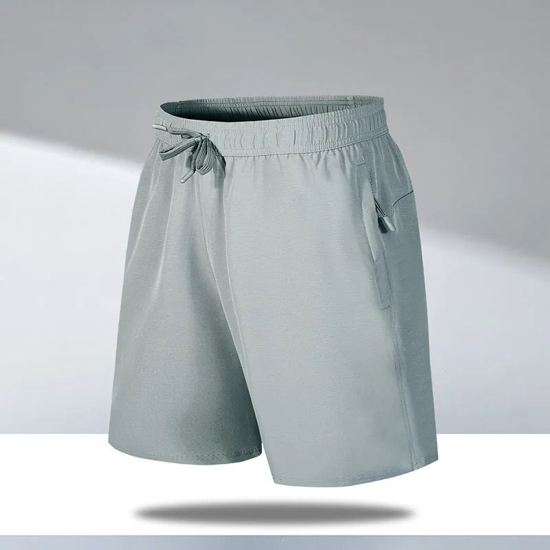 Men's loose fit quick-dry beach shorts in polyester ice silk fabric with micro-elastic waistband