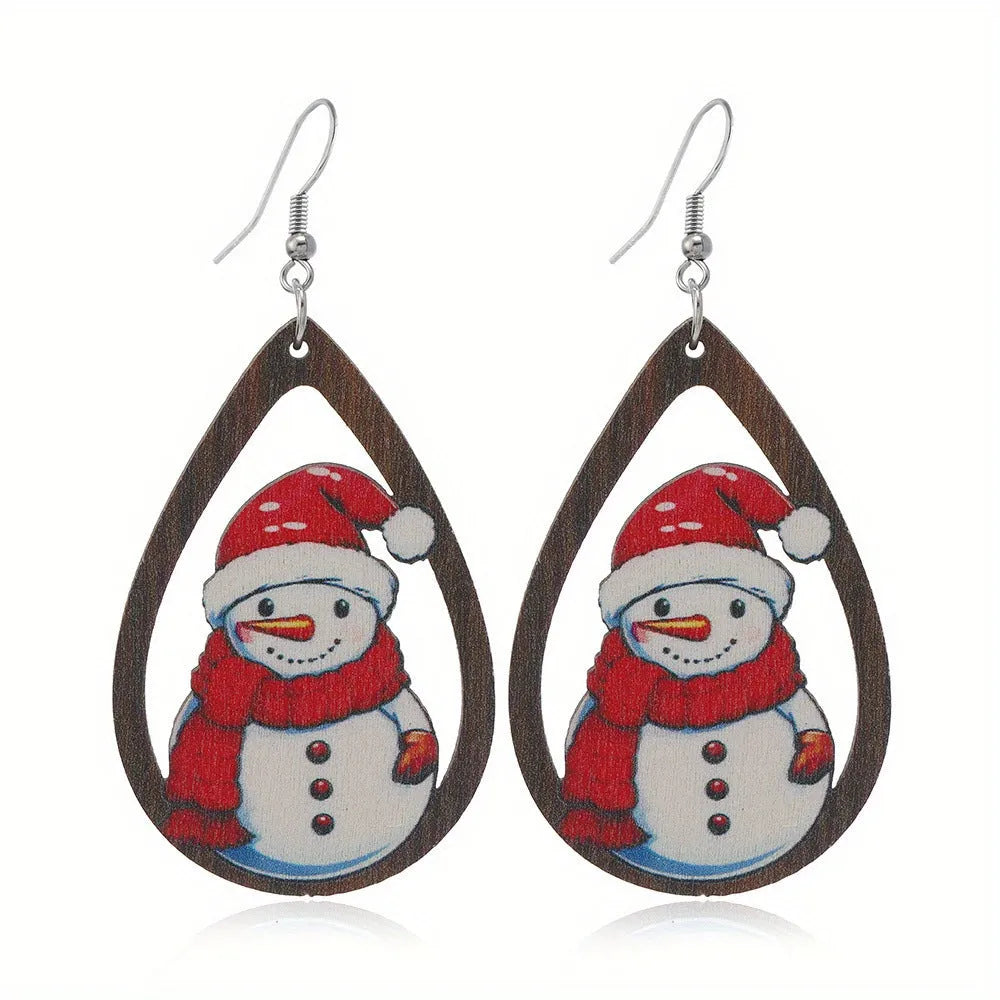 Wooden Christmas earrings with geometric tree and snowman designs featuring Santa Claus elements