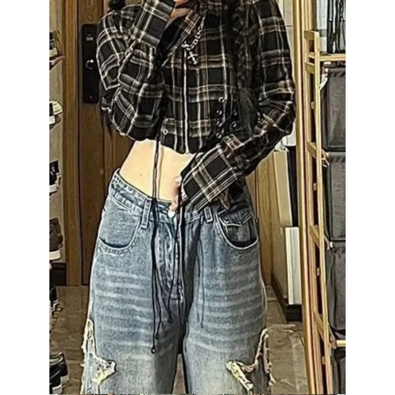 Blue high-waist wide-leg denim trousers with straight cut on mannequin