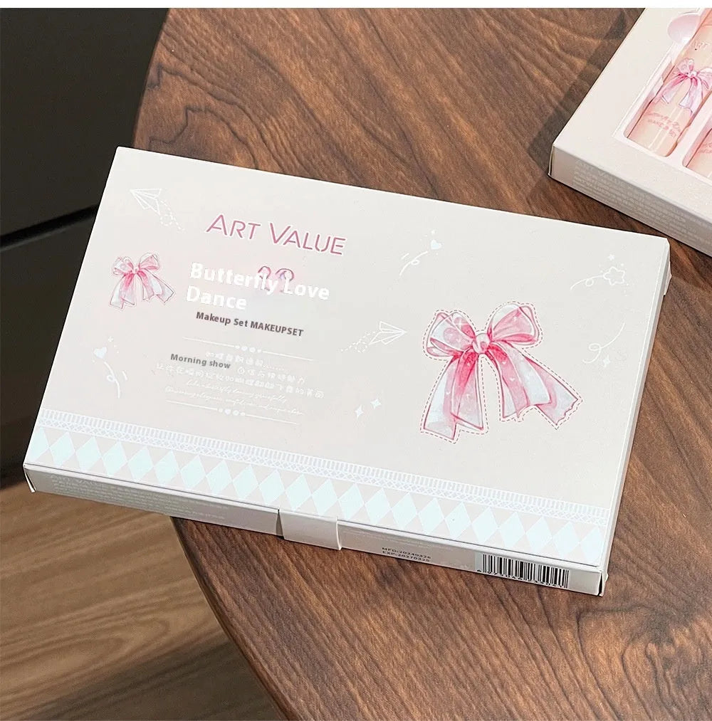 Butterfly Box makeup set with four pink lip mud pots, powder blusher, and necklace