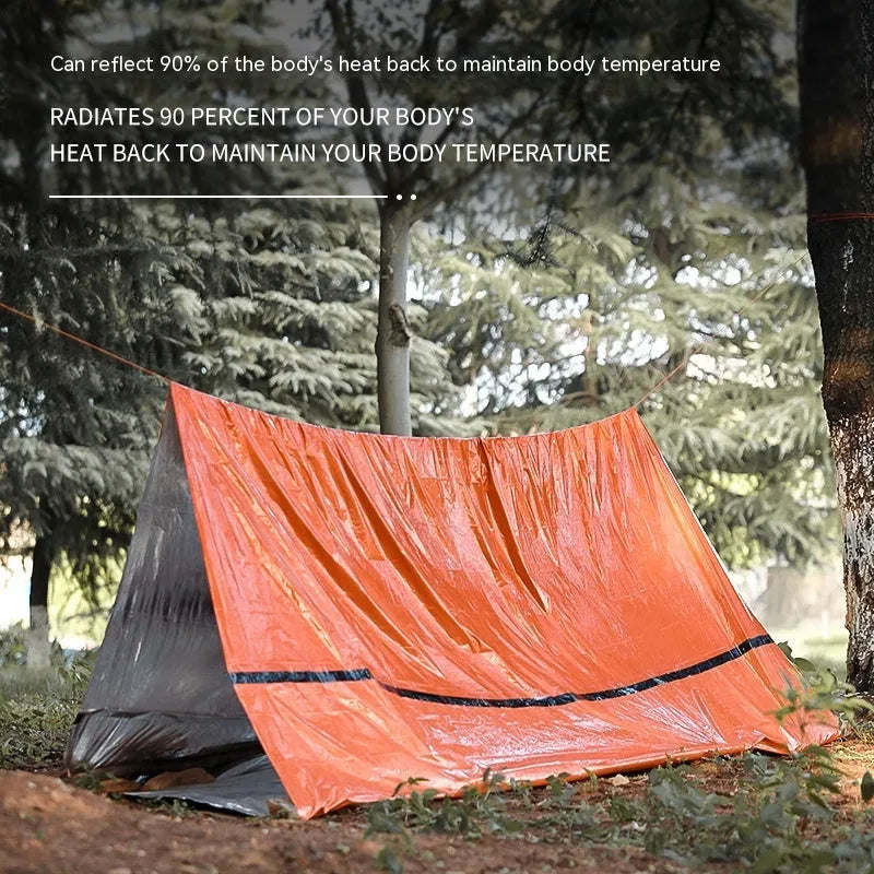 Orange emergency tent kit with sleeping bag, raincoat and whistle for disaster relief