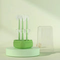 Soft silicone pet toothbrush for dogs and cats in purple, blue, and green colour options.