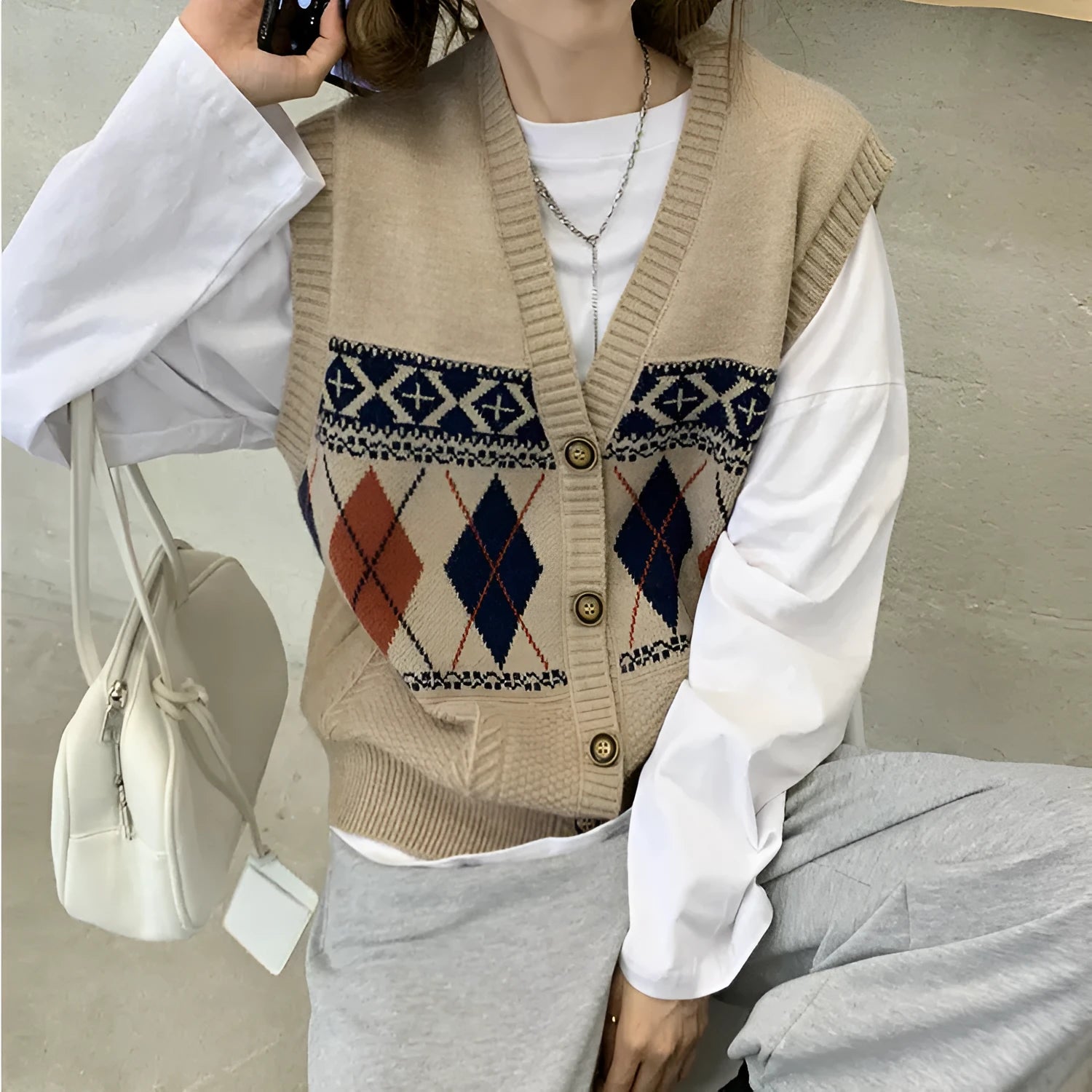 Diamond plaid pattern sleeveless cardigan top in loose free size fit