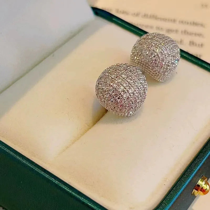 Little Golden Beans geometric drop earrings with full diamond-cut crystal surface and spherical elements