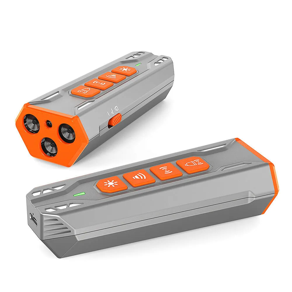 Handheld three-head ultrasonic dog trainer in black and orange colour scheme