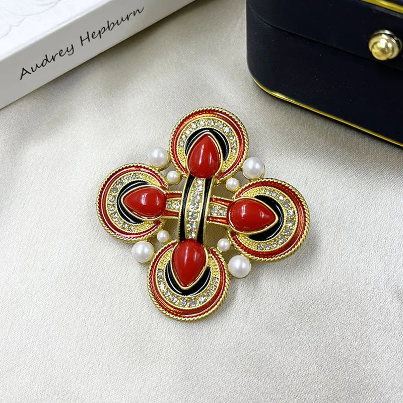 Medieval baroque crystal cross brooch in zinc alloy with ornate design on dark background