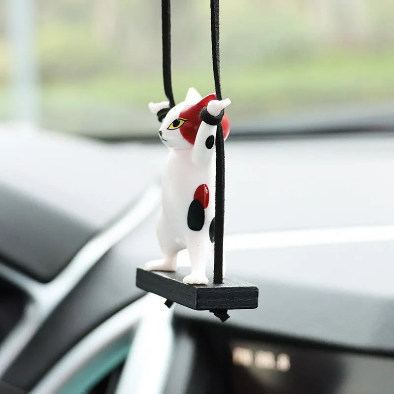 Cartoon-style resin cat pendant on adjustable rope for car interior decoration