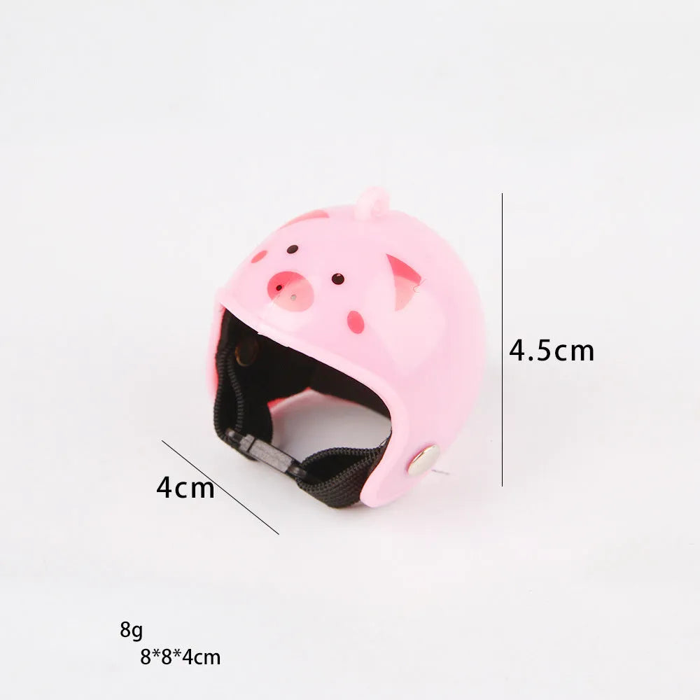 Small adjustable plastic safety helmet for a chicken or bird, shown in a fun design.