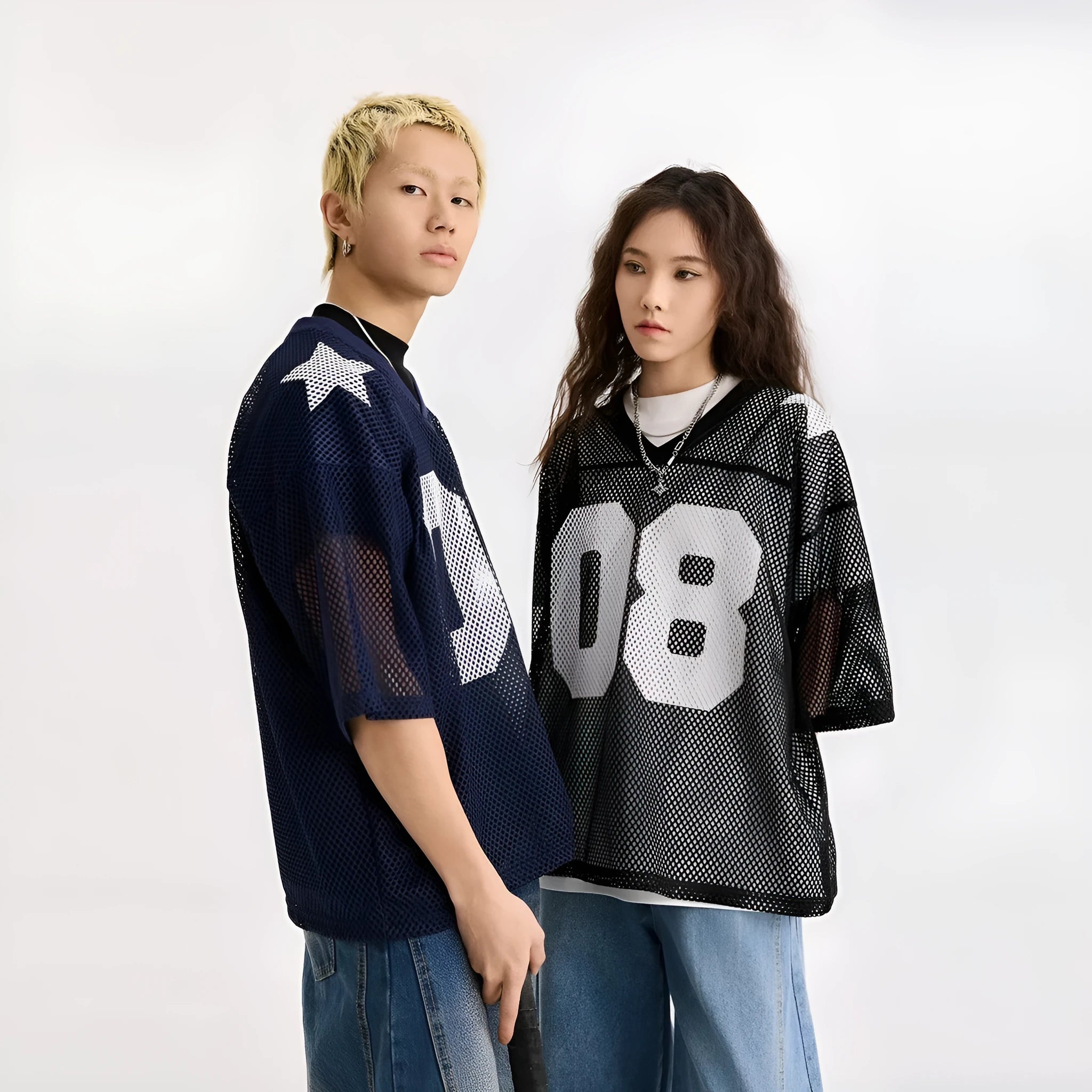Letter pattern pullover shirt in loose fit with short sleeves available in black or navy blue