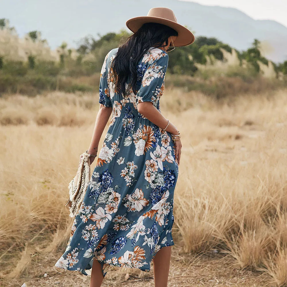Women's floral summer beach dress with V neck and elastic waist in mid-length cut