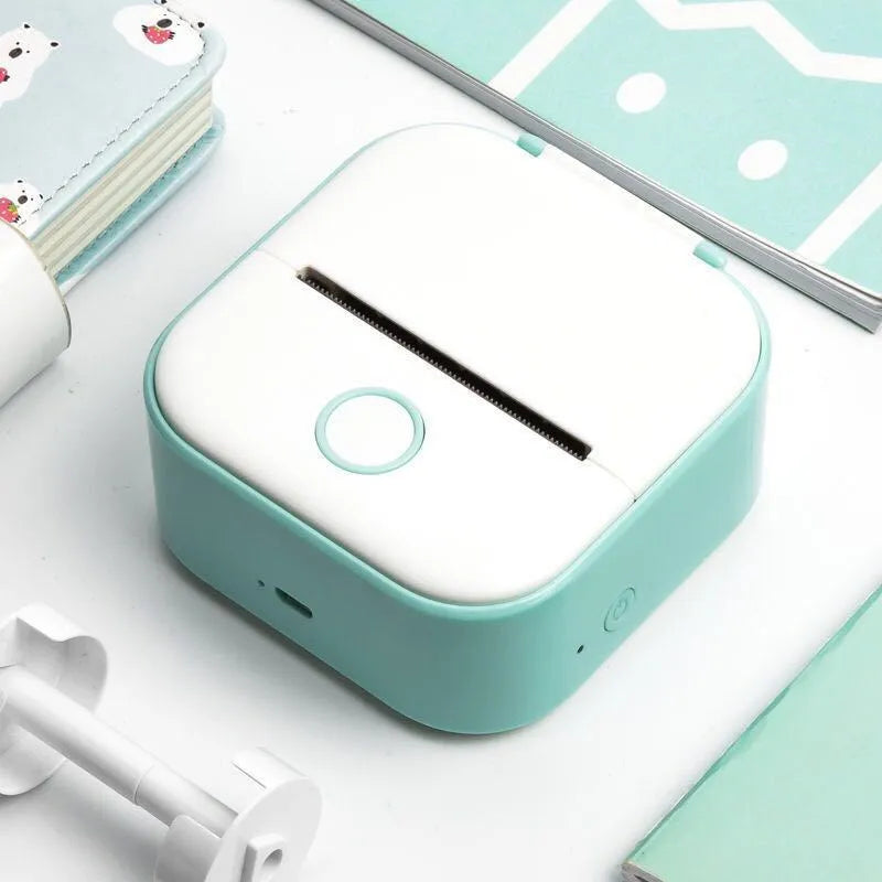 Phomemo T02 portable mini thermal label printer in white with Bluetooth connection