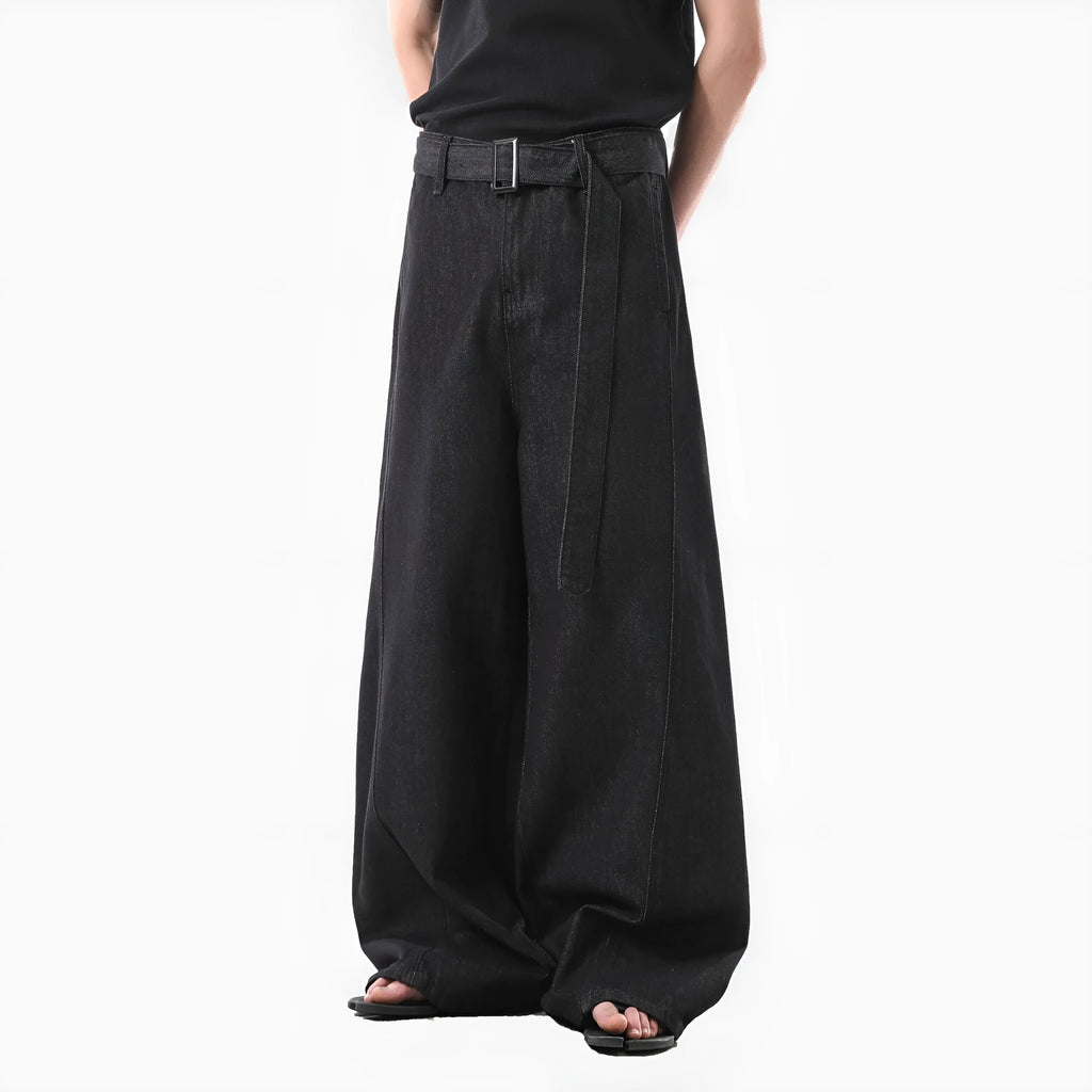Black high waist straight leg women's jeans with gold detailing on a mannequin.