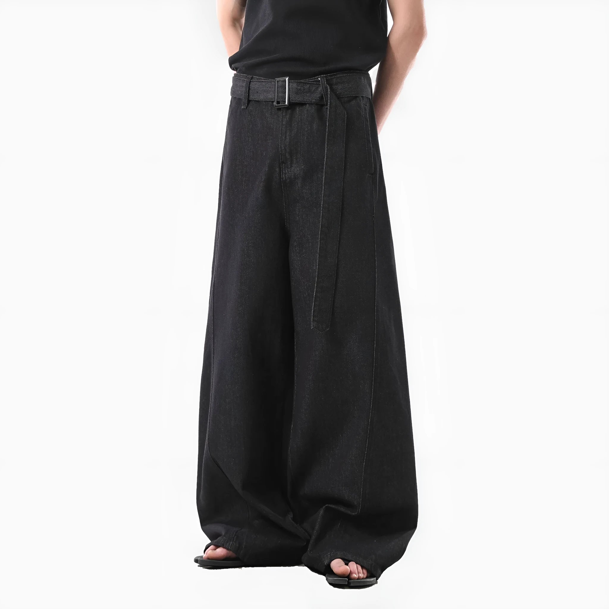 Black high waist straight leg women's jeans with gold detailing on a mannequin.