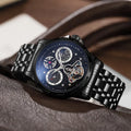 Men's waterproof automatic watch with luminous markers on a steel bracelet and a black dial.
