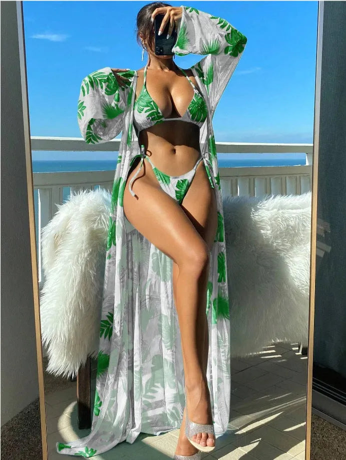 Women's floral print banded bikini set with long sleeve robe cover-up in blue colour