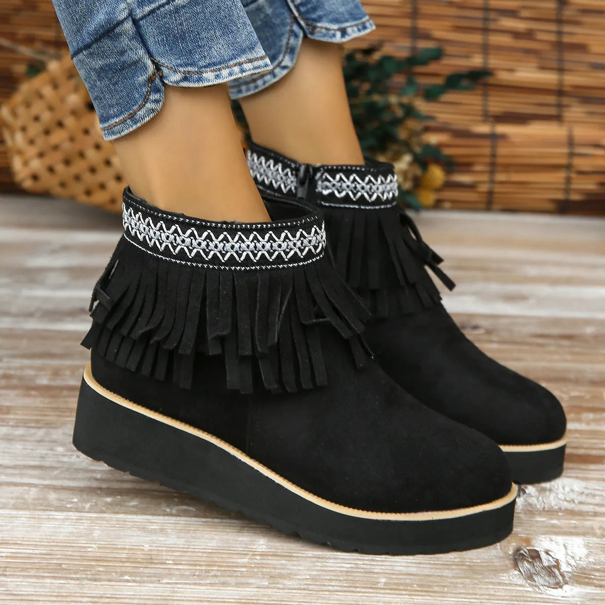 Women's black suede wedge boots with a side zipper and thick platform sole