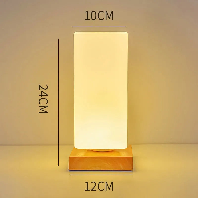 Nordic solid wood USB table lamp in cube style with touch dimming control on wooden desk