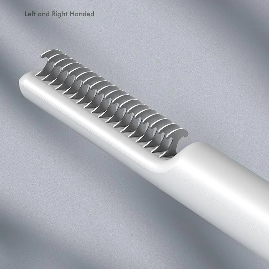 Pink and white pet dematting combs with stainless steel teeth on a wooden surface