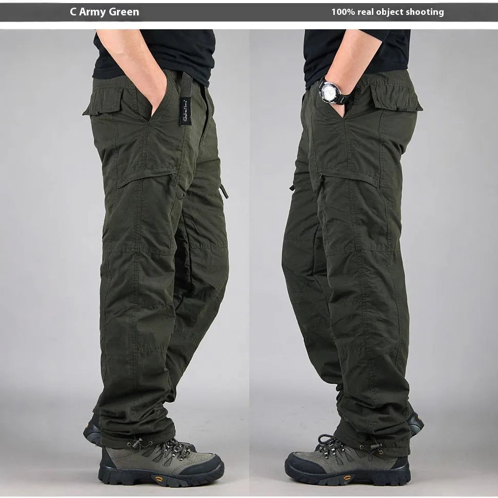Men's stone-washed cotton overalls with a velvet lining, shown in a loose straight-leg fit.