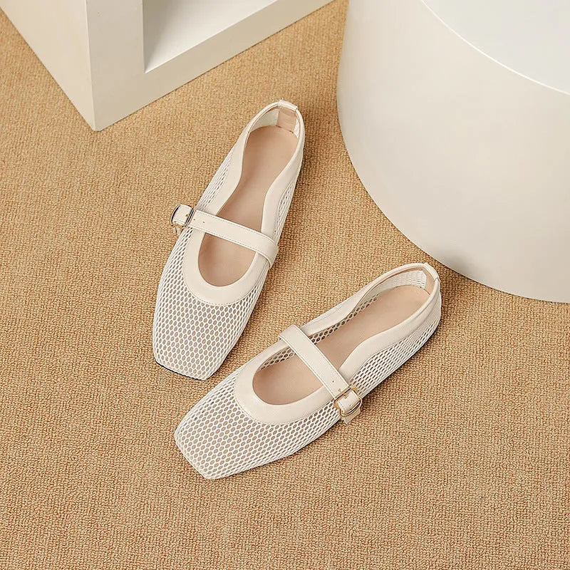 Women's beige mesh low heel pump with a buckle strap and square toe on a neutral background.