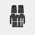 Tesla Model X waterproof TPE rubber floor mats showing left and right rudder design for vehicle-specific fitment