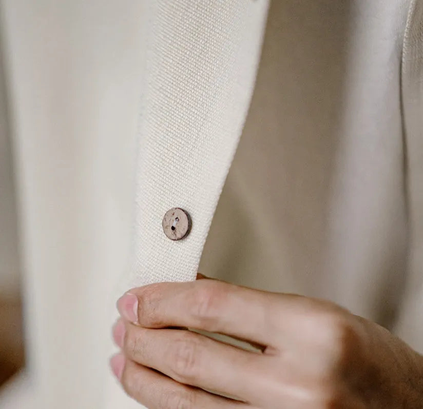 Light apricot men's shirt with bamboo and flower pattern and a Cuban collar.