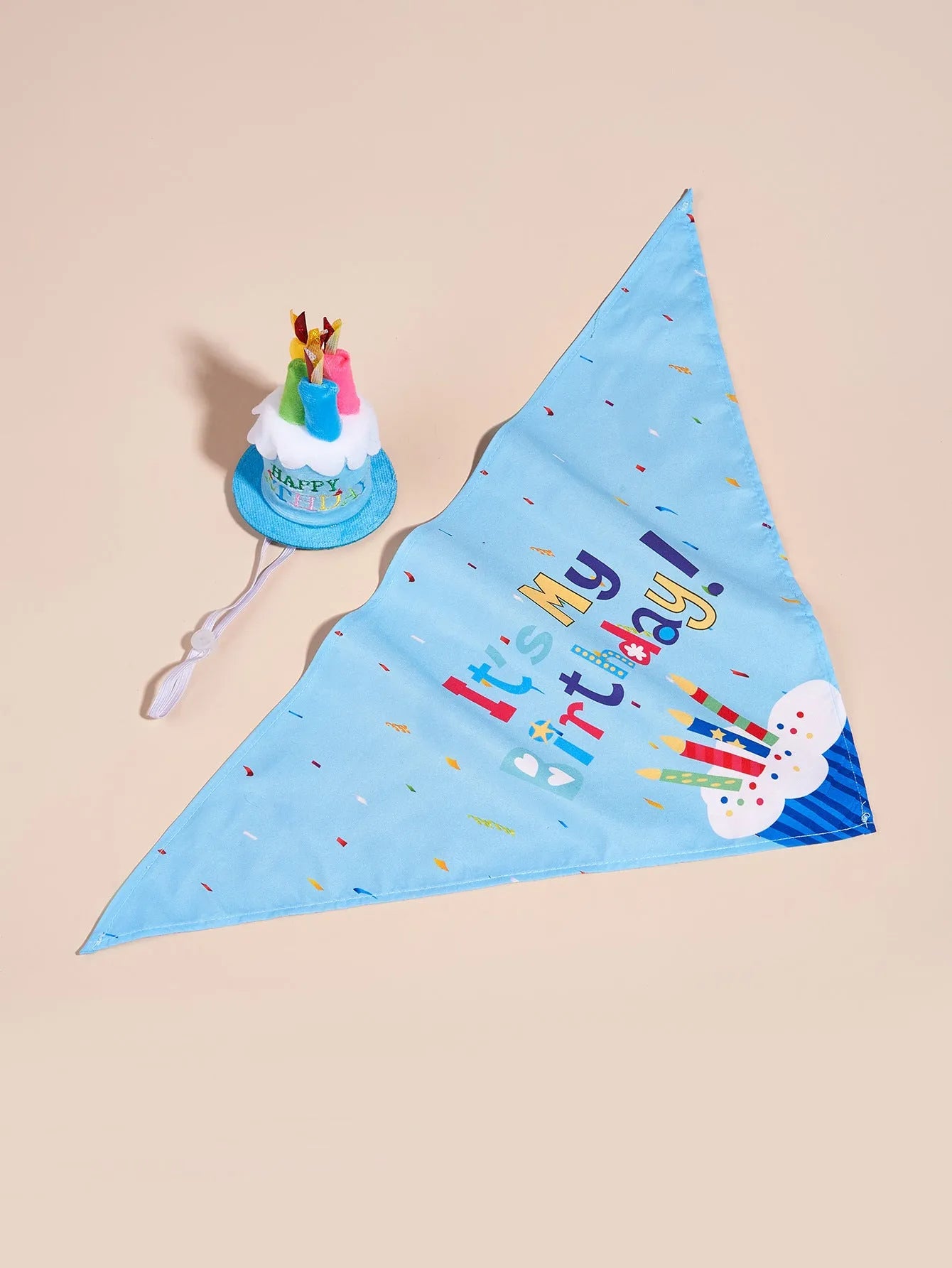 Printed polyester dog birthday hat and drool towel set in blue with creative triangular binder design