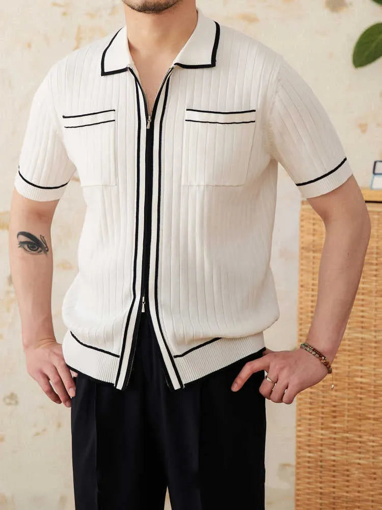 Slim black and white elastic knit polo shirt with lapel collar and short sleeves on hanger