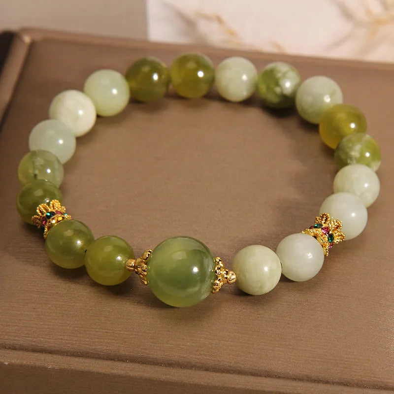 Xiuyan jade green women's bracelet in an original light luxury Mori style design.