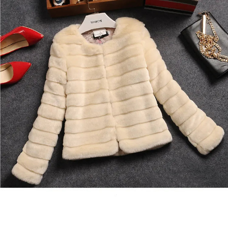 Women's short length faux fur top in white, black or beige with regular sleeves, 40cm length