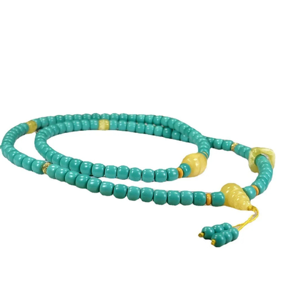 Turquoise stone pendant with hand-woven mesh flower design on adjustable ball bead necklace chain