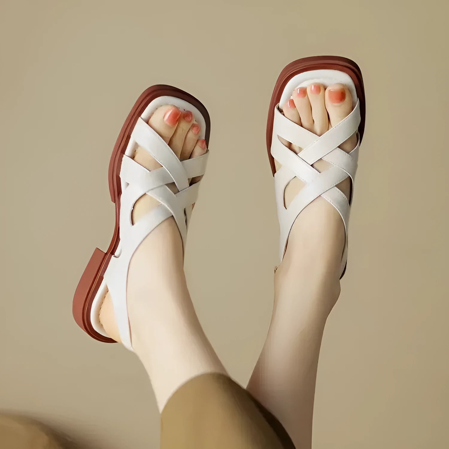 Women's glossy patent leather sandals with square toe and cross ankle strap in black, white, or brown.