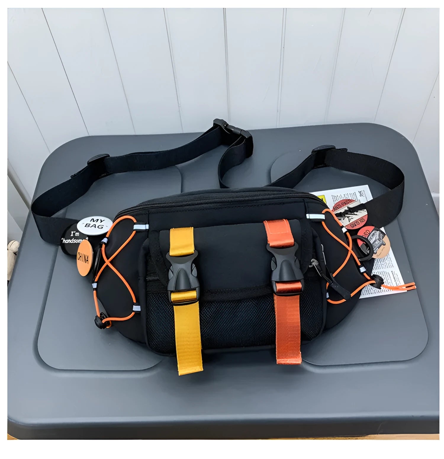 Fashion brand ladies nylon messenger bag with bungee style, black with badge, medium size, plain pattern