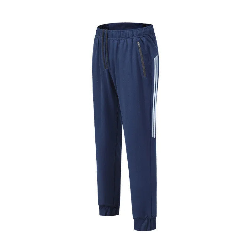 Men's black running trousers with mid waist design and breathable polyester construction for spring exercise