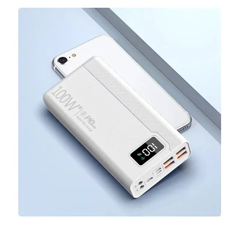 Black and white plastic power bank showing dimensions of 150 by 76 millimetres