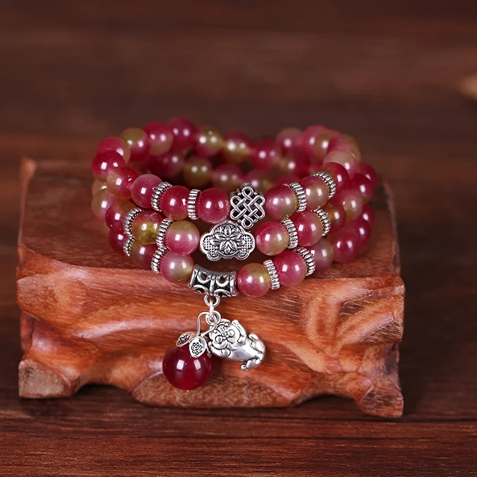 Handmade natural watermelon crystal bracelet with Chinese knot fastening and geometric beads
